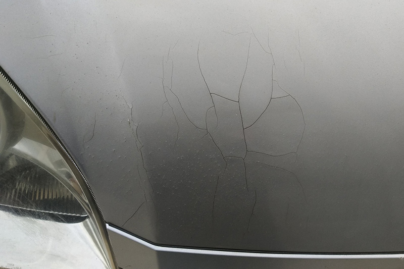 How does car paint crack during trial work？